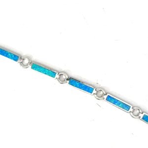 Sterling Silver rhodium plated created blue opal inlay line bracelet with claw catch closure