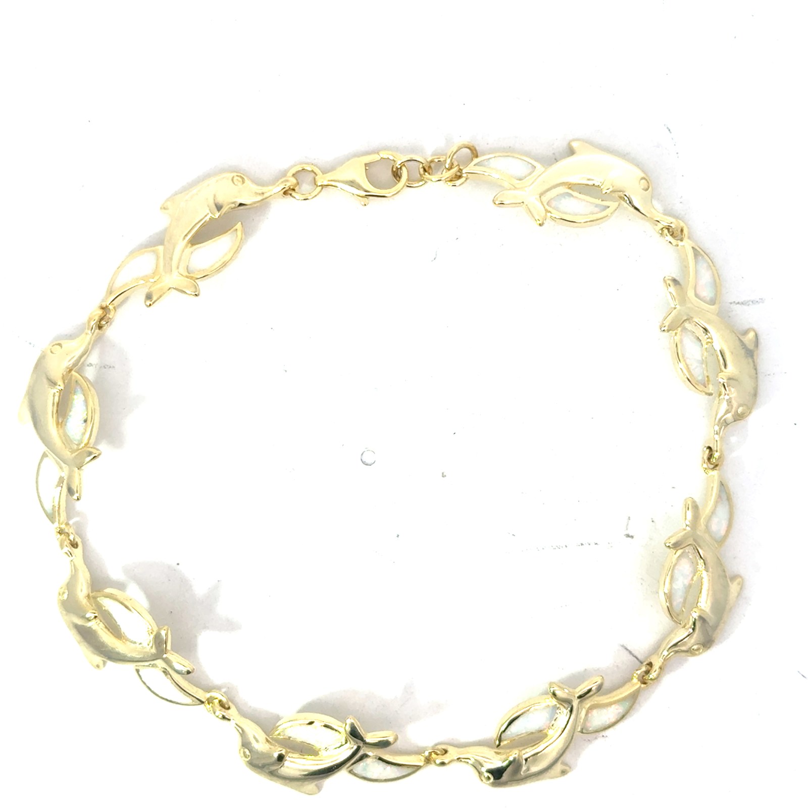 G .jpg Sterling Silver gold plated creaed white opal jumping dolphin bracelet with claw catch closure