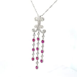 18kt wg ruby and diamond necklace 10- 4x3 genuine rubies 2.34ct, 0.60 pts 51 round diamonds