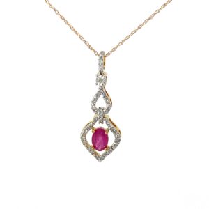 10kt yellow gold diamond and genuine oval ruby pendant D tw 0.15cts SI2 clarity, near colorless I color