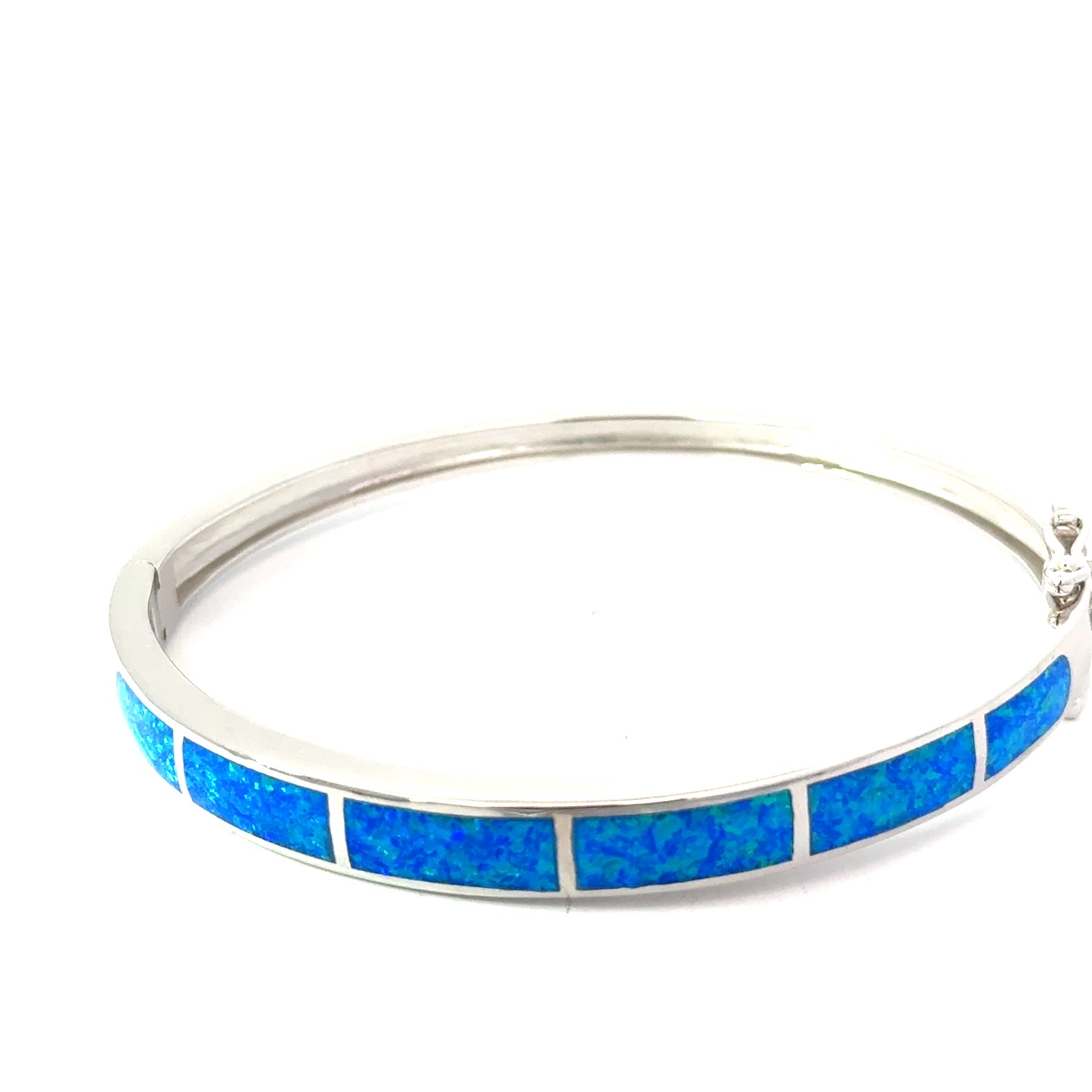 Sterling Silver rhodium plated created blue opal inlay bangle bracelet with two foldover safety