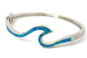 Sterling Silver rhodium plated created blue opal inlay wave bangle bracelet with safety catch