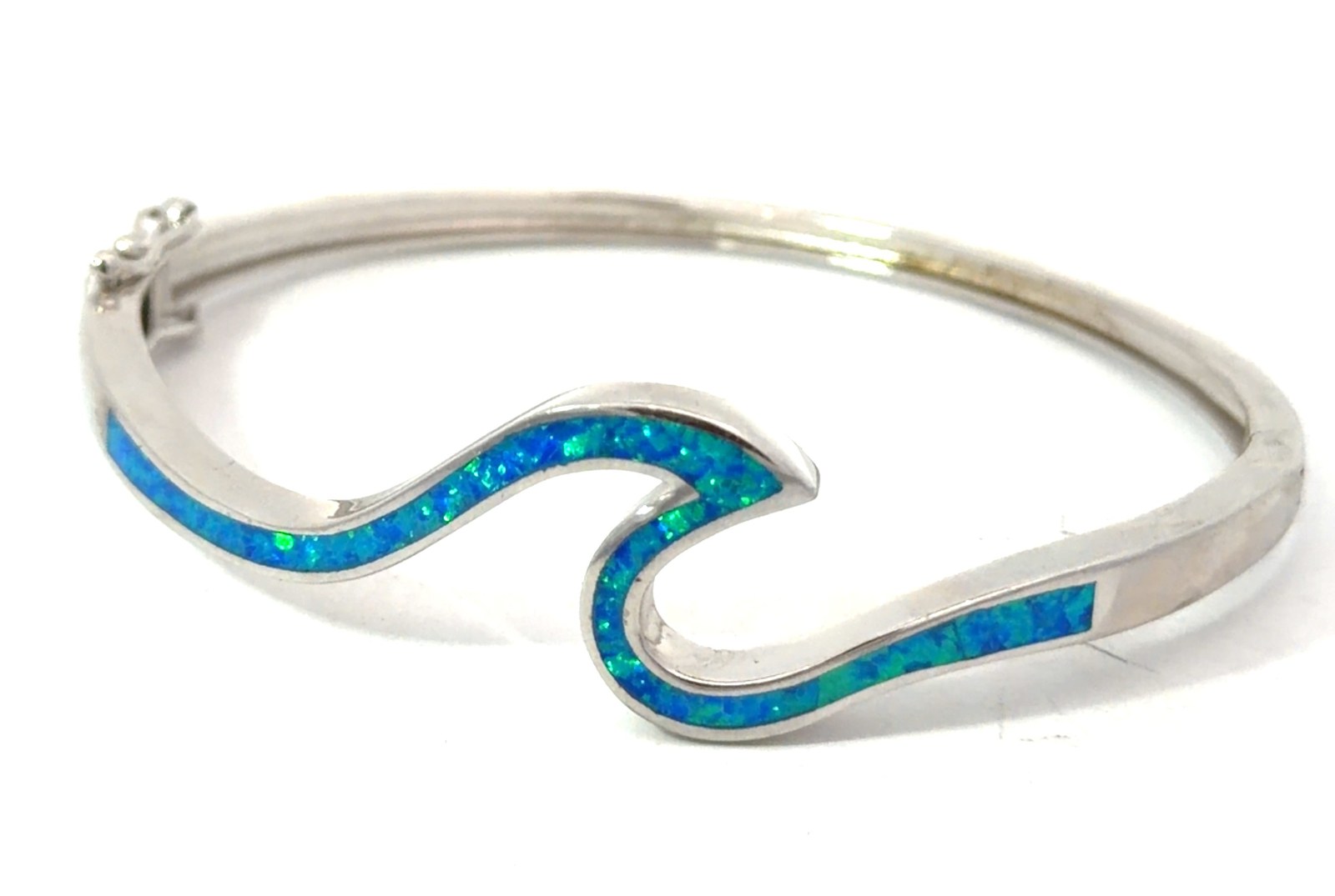 Sterling Silver rhodium plated created blue opal inlay wave bangle bracelet with safety catch