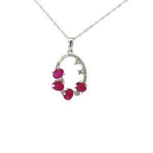 10kt white gold diamond and ruby 4 stone pendant D tw 0.18cts SI2, near colorless I