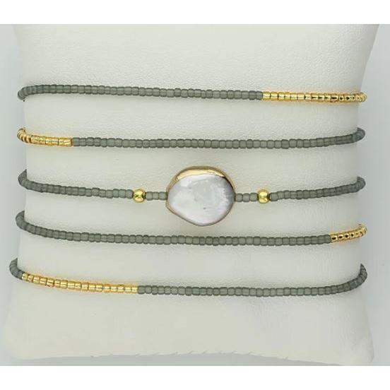 bnkgd .jpg 17.5" gold plated beaded stretch bracelet/necklace with seeded beads and a freshwater pearl necklace. Wrap around to wear as a bracelet