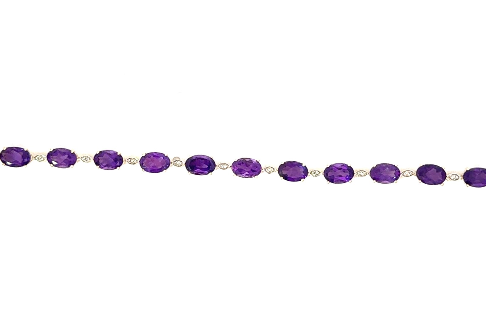 .jpg 10kt yellow gold diamond and amethyst oval bracelet A tw 11.00cts D tw 0.12cts SI clarity, near colorless I color