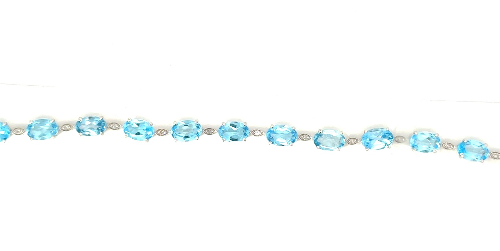 .jpg 10kt white gold blue topaz and diamond bracelet BT tw 11.00cts D tw 0.12cts SI clarity, near colorless I
