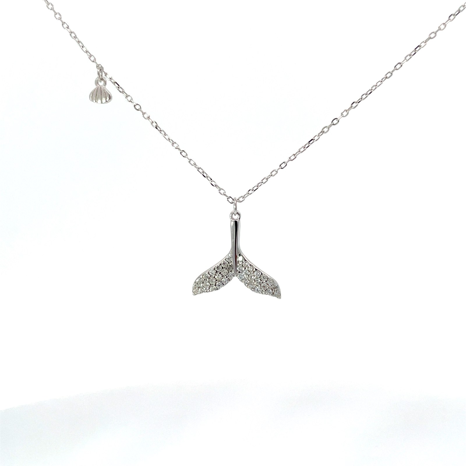.jpg Sterling Silver cubic zirconia petite whales tail and shell pendant on adjustable chain