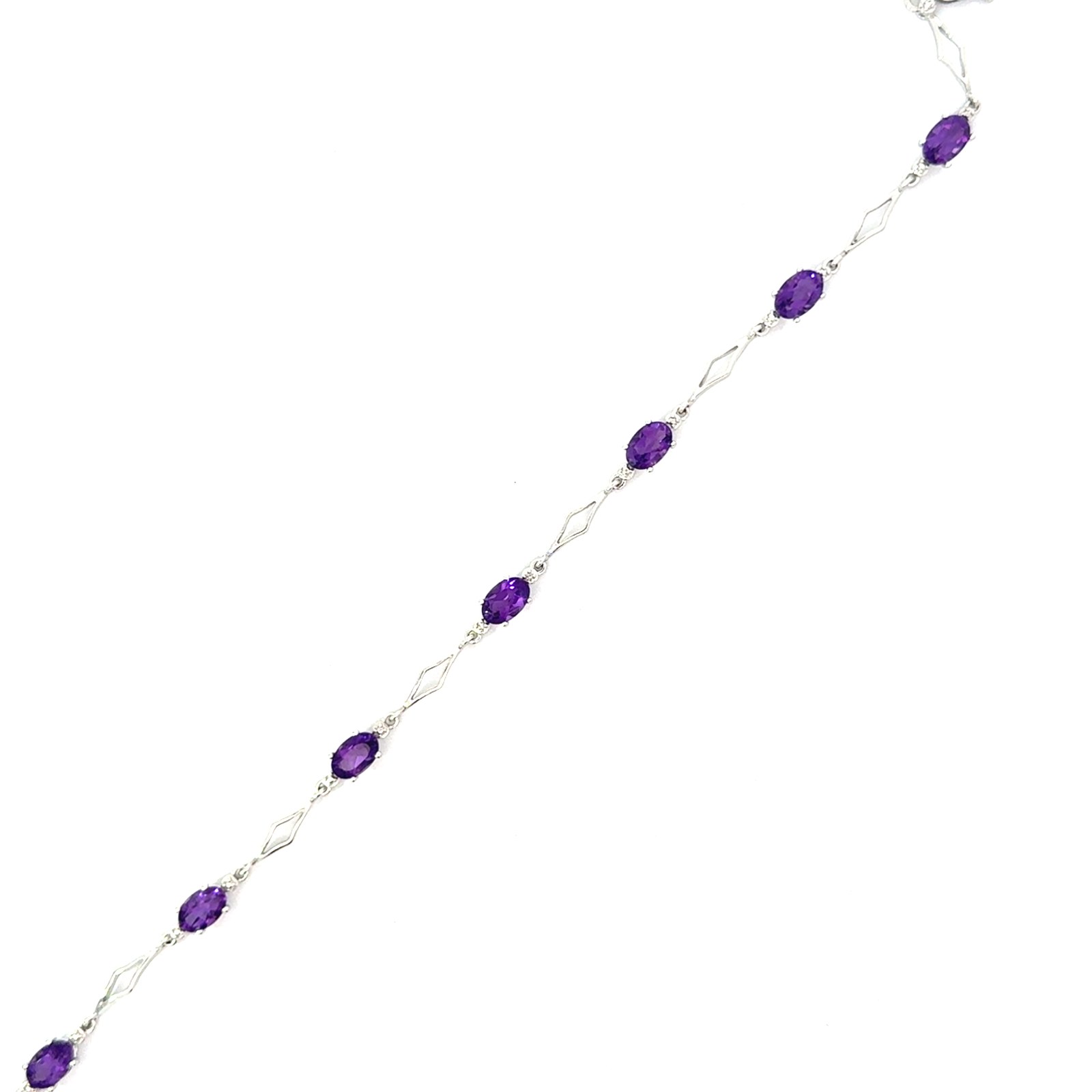 .jpg 10kt white gold amethyst and diamond open link bracelet with claw catch closure