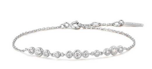 Sterling Silver rhodium plated graduated cubic zirconia bezel set trios adjustable bracelet