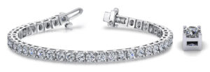 14kt white gold standard 4 prong diamond tennis bracelet tw 5.03cts, VS clarity, colorless F color with foldover underneath for safety 7"