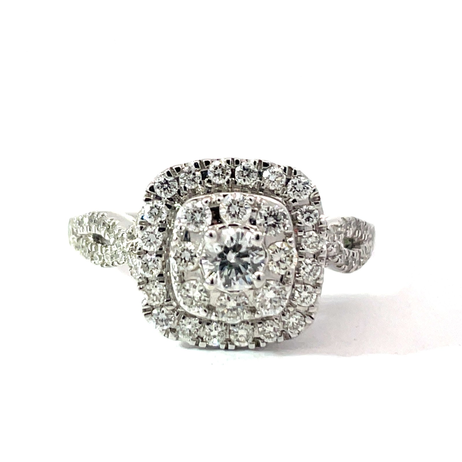 B .jpg 14kt white gold diamond double cushion shape halo with fancy twisted shank ring C tw 0.20cts SI2, near colorless H tw 0.85cts SI near colorless G