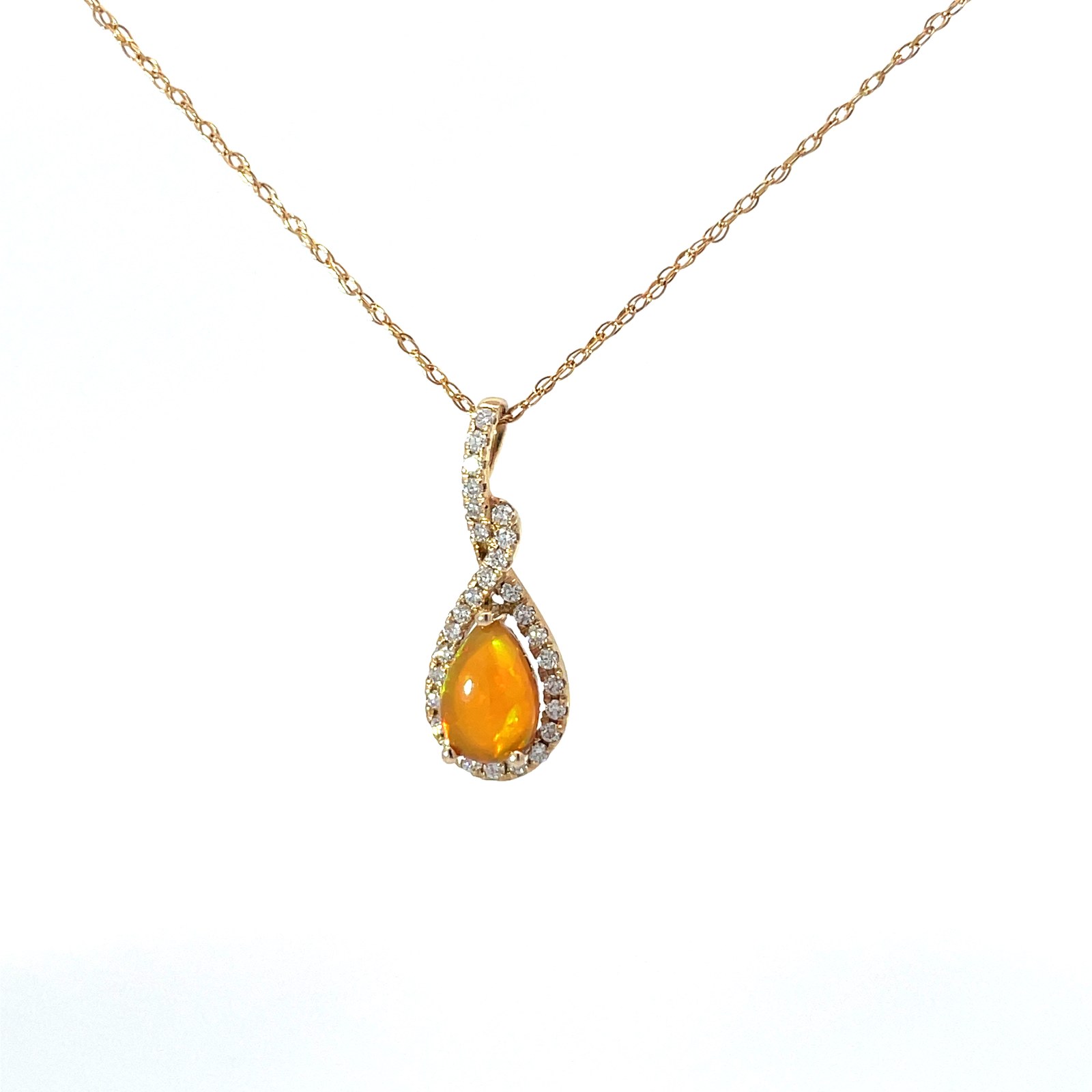 B 14kt yellow gold ethiopian opal and diamond pendant Opal tw 0.90cts D tw 0.28cts SI, H