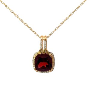 14kt yellow gold diamond and garnet cushion halo pendant D tw 0.12cts G tw 2.55cts 18"