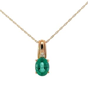 10kt yellow gold diamond and emerald pendant on machine made rope D tw 0.02cts E tw 1.14cts