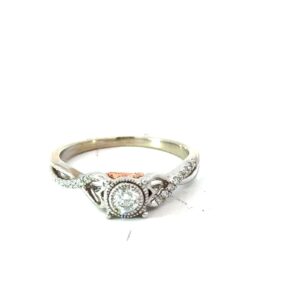 10kt two tone diamond ring tw 1/4ct SI2/I1 clarity, near colorless I color with hearts and infinity on sides