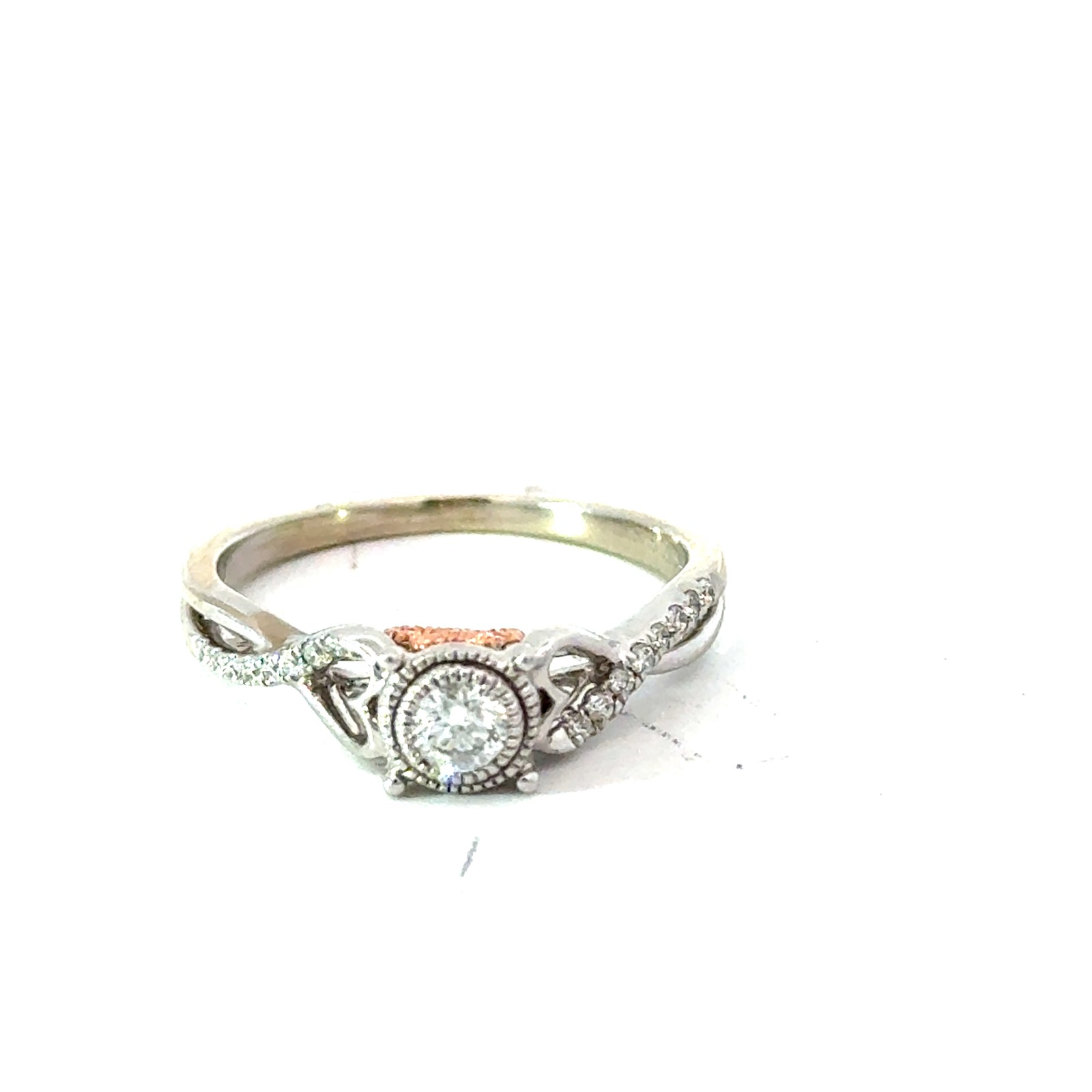 10kt two tone diamond ring tw 1/4ct SI2/I1 clarity, near colorless I color with hearts and infinity on sides