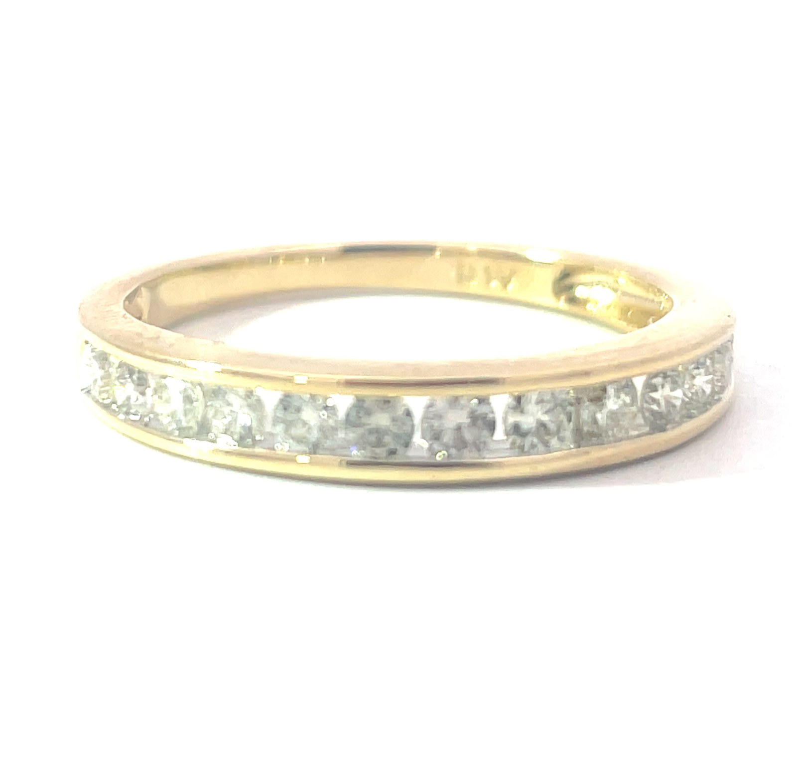 B .jpg 14kt yellow gold diamond channel set wedding band D tw 0.50cts SI clarity, near colorless G/H color