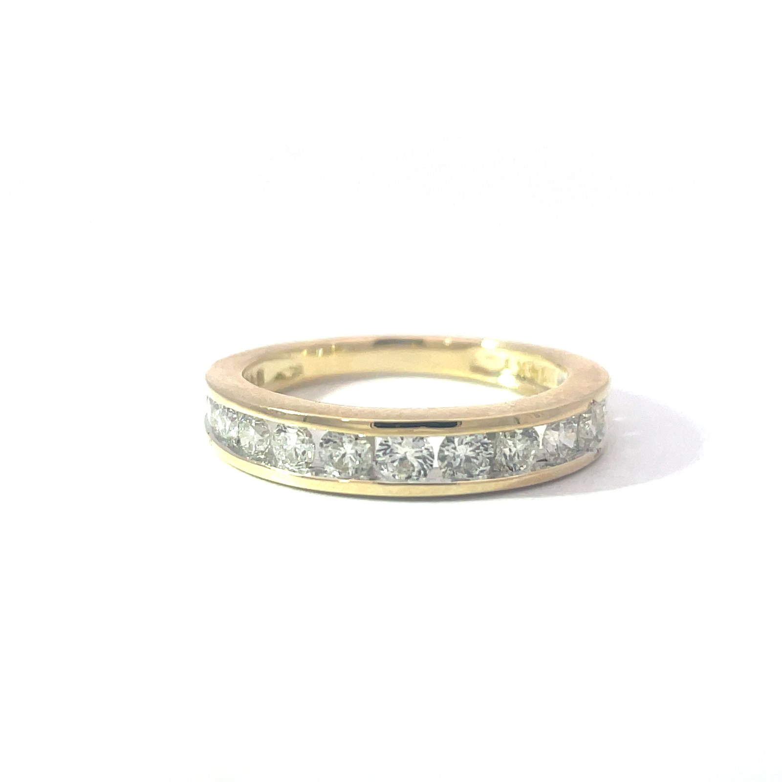 B .jpg 14kt yellow gold diamod channel set wedding band D tw 1.00cts VS2/SI1 clarity, near colorless H color