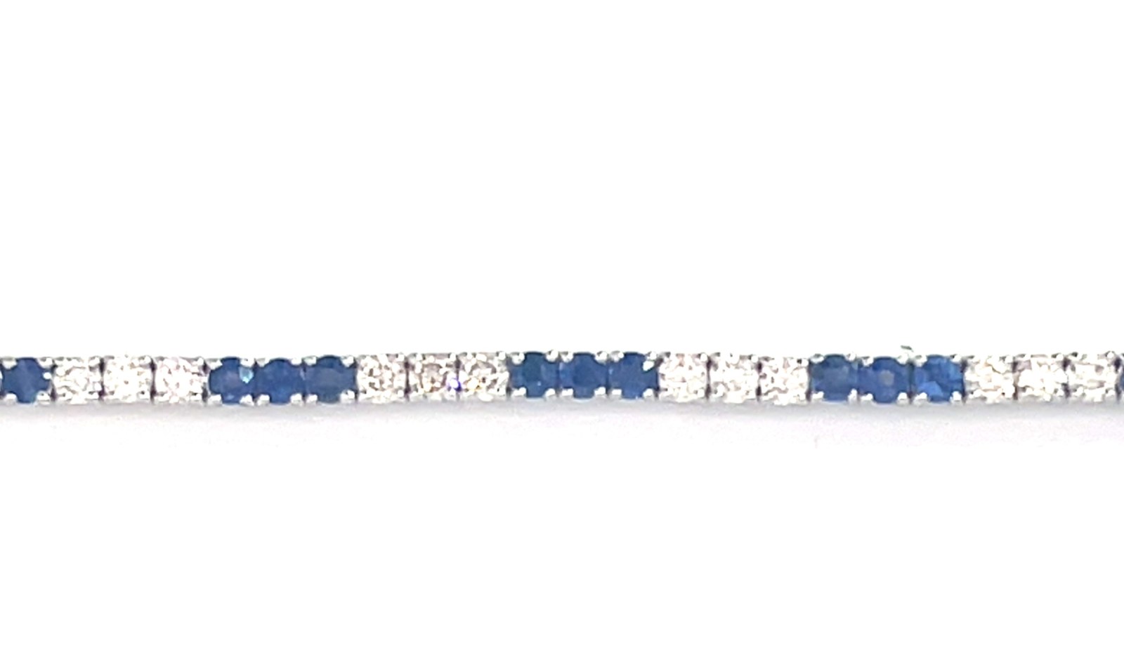 B .jpg 14kt white gold diamond an genuine sapphire tennis bracelet D tw 1.81cts VS2 clarity, near colorless H color S tw 1.96cts with foldunder safety