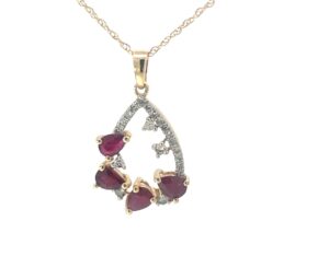 14kt yellow gold diamond and pear shape ruby pendant Dtw 0.11cts R tw 1.00cts SI2, near colorless H color 18"
