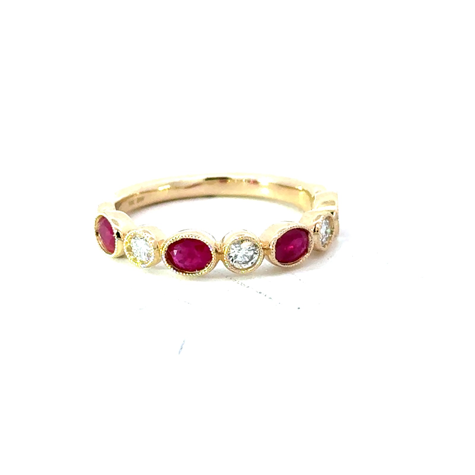 14kt yellow gold genuine Ruby and Diamond band D tw 0.22cts R tw 0.83cts SI2 clarity, near colorless H/I color