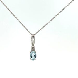 14kt white gold genuine aquamarine and diamond pendant A tw 0.30cts D tw 0.02cts SI clarity, near colorless I color on 18" machine made rope