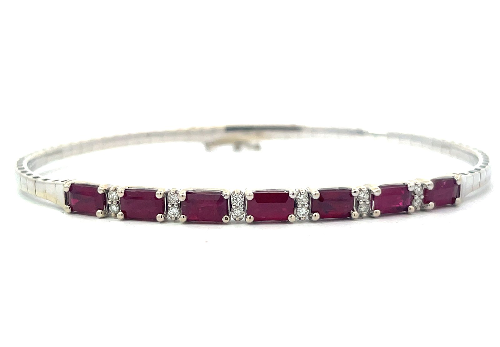 BCE RU .jpg 14kt white gold diamond and Ruby flex bangle bracelet D tw 0.12cts R tw 2.25cts SI, H