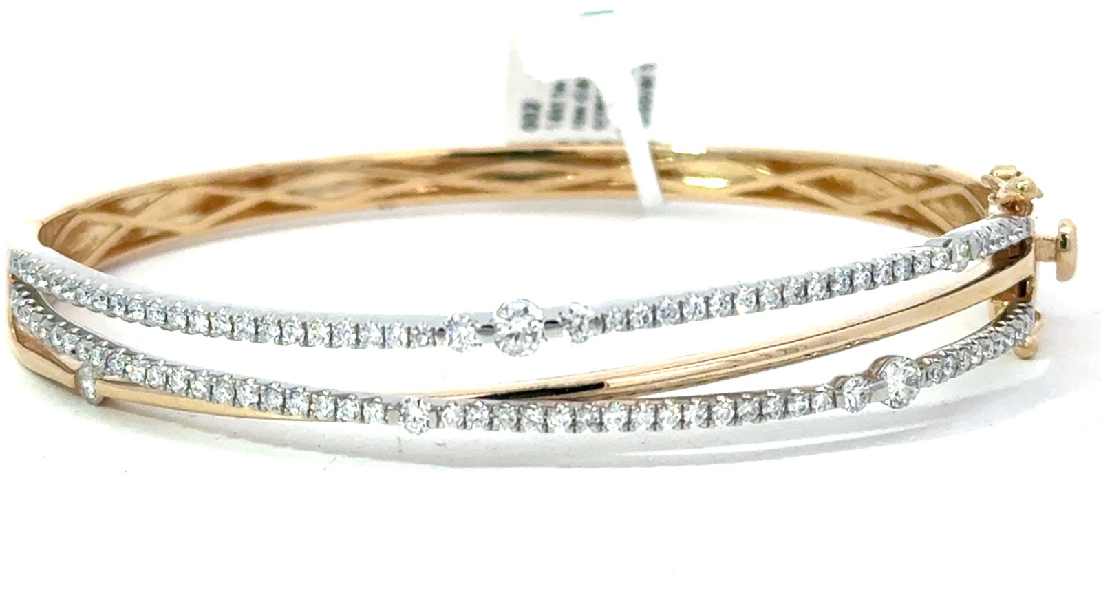 14kt two tone multi row diamond crossover bangle brac. with two foldover tw 1.32cts SI clarity, H/I color