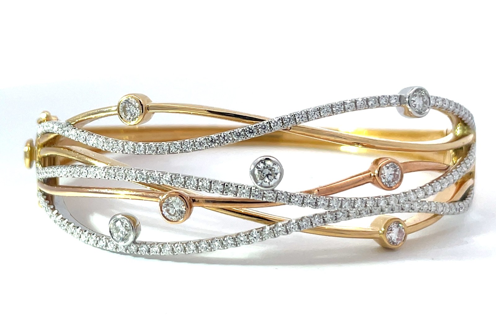 BD .jpg 18kt tri colored 6 row fashion cross over diamond bangle bracelet D tw 2.50cts VS2/SI1 clarlity, near colorless G/H color