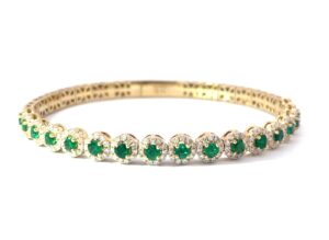 14kt yellow gold diamond and emerald flex bangle bracelet D tw 0.96cts E tw 1.42cts VS2 clarity, near colorless H color