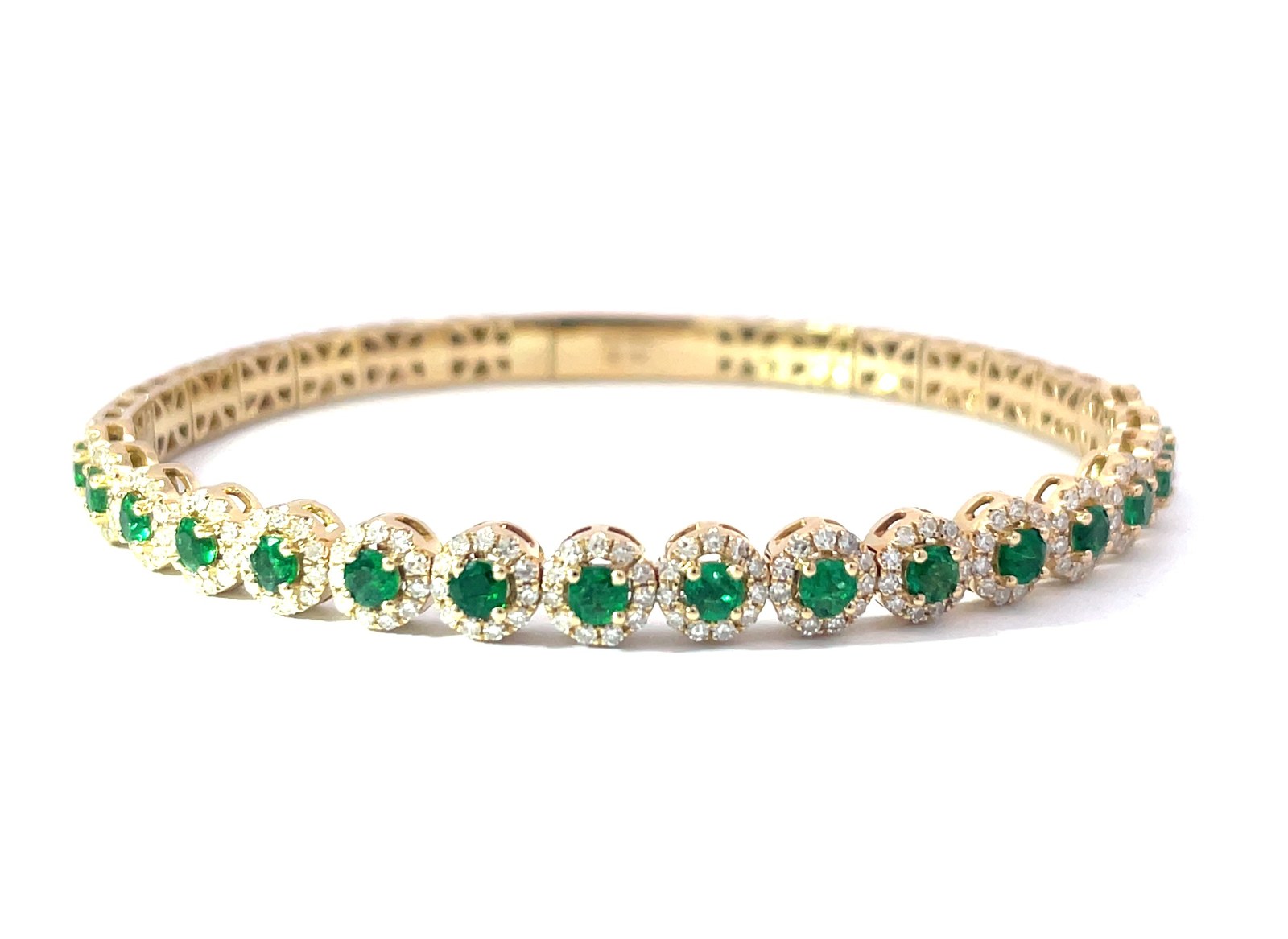14kt yellow gold diamond and emerald flex bangle bracelet D tw 0.96cts E tw 1.42cts VS2 clarity, near colorless H color
