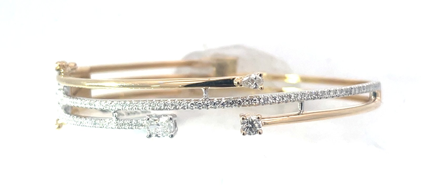 14kt two tone diamond bypass bangle bracelet D tw 1.11cts SI clarity, near colorless H color with two foldover safties