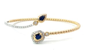 14kt yellow gold genuine diamond and sapphire flex cuff bracelet S tw 0.55 D tw 0.44cts SI, H color