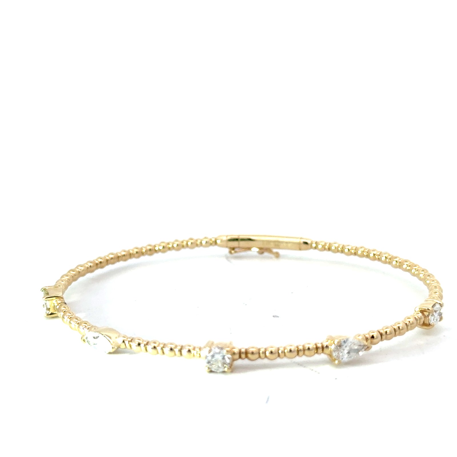 14kt yellow gold multi shape brilliant diamond flex bangle bracelet D tw 1.26cts SI1 clariry, near colorless H color with foldover safety