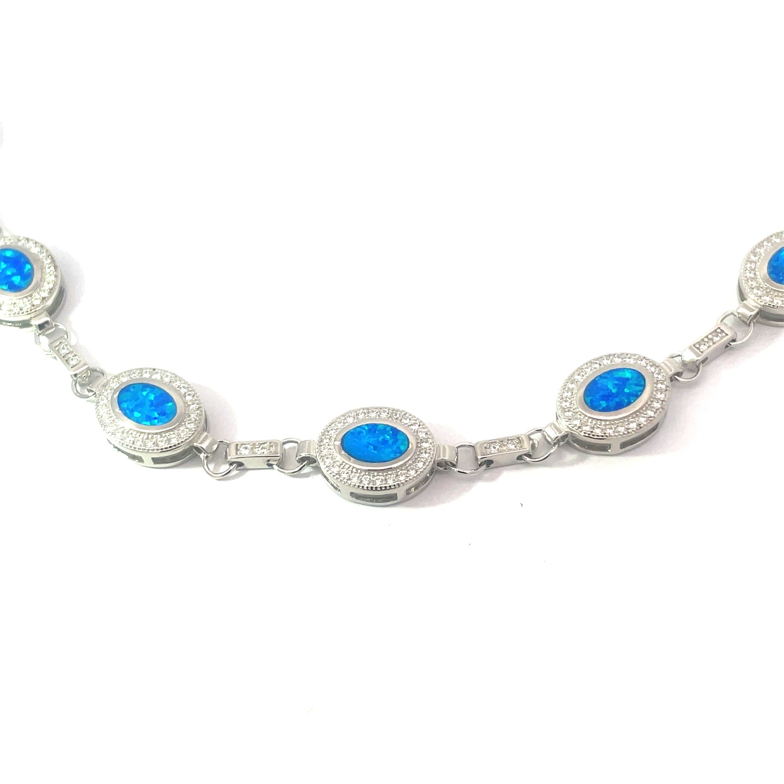 BOCZ .jpg Sterling Silver created blue opal inlay micropave cubic zirconia oval link bracelet