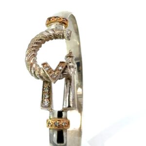 SS 4MM CM BRAC WITH 14KT Y/G WRAP6.5" WITH 12 DIA 0.13PTS, SI / G