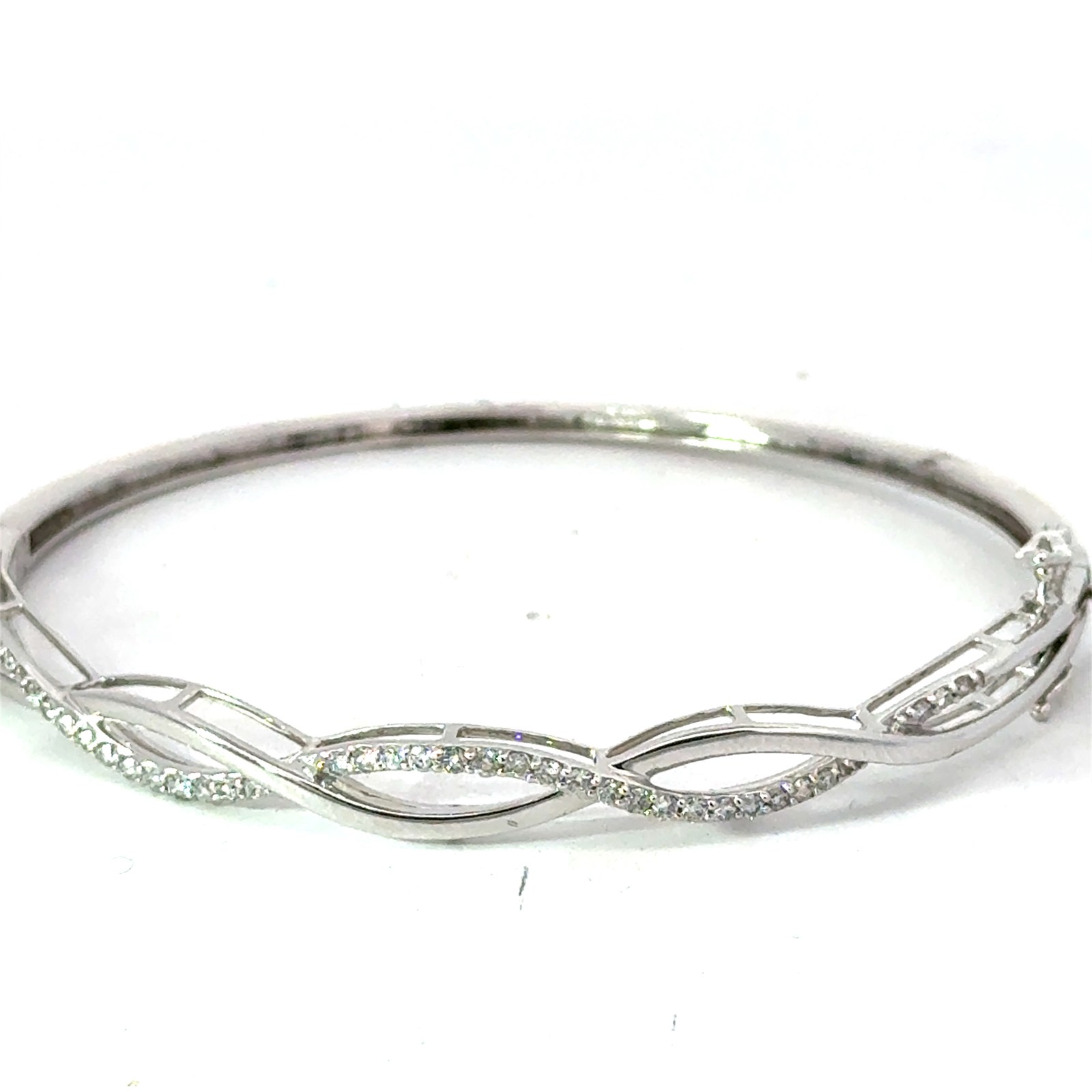 10kt white gold diamond twisted bangle bracelet with foldover safety D tw 0.50cts SI clarity, near colorless H color