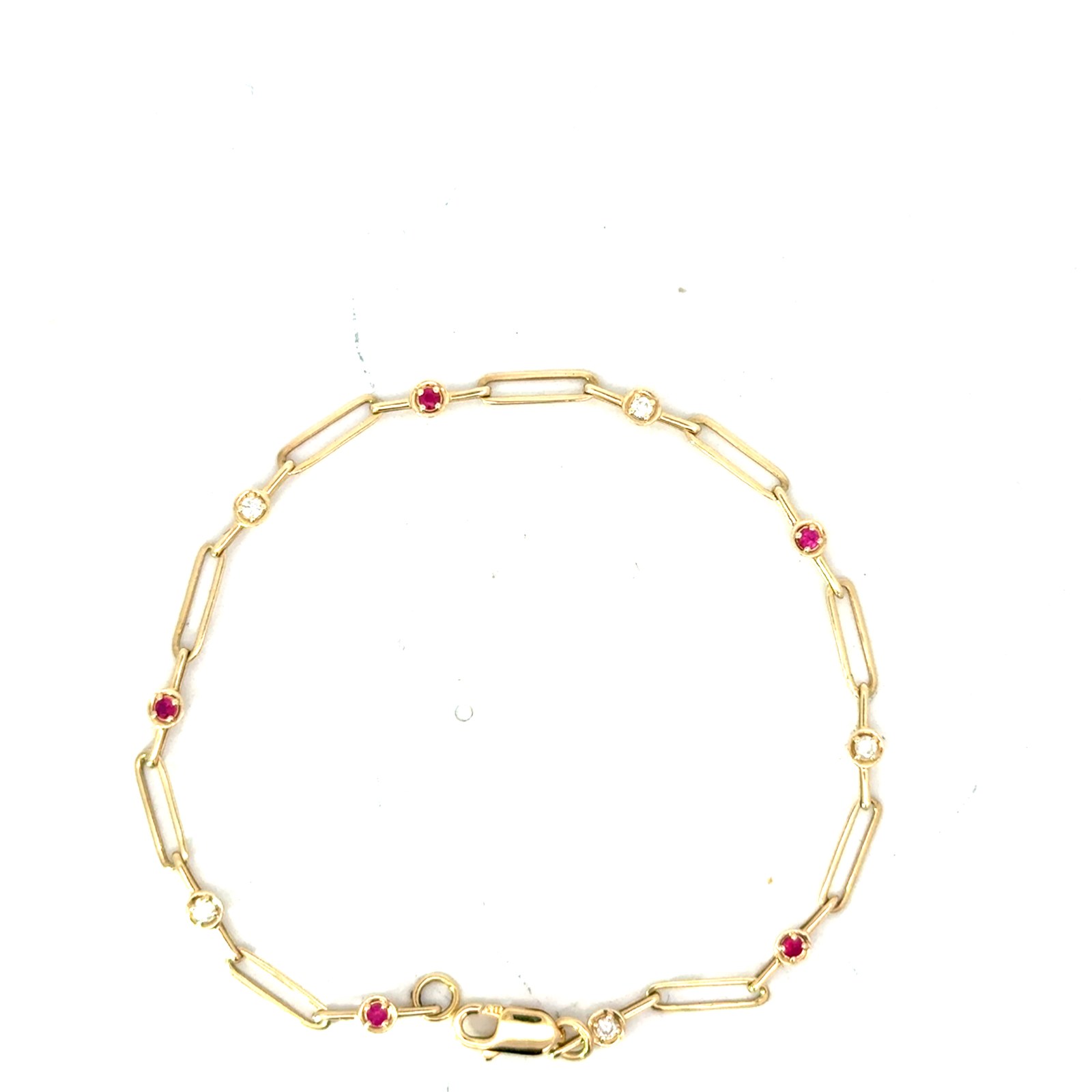GBR .jpg 14kt yellow gold ruby and diamond link bracelet D tw 0.13cts R tw 0.15cts SI clarity, near colorless H/I color with claw catch closure