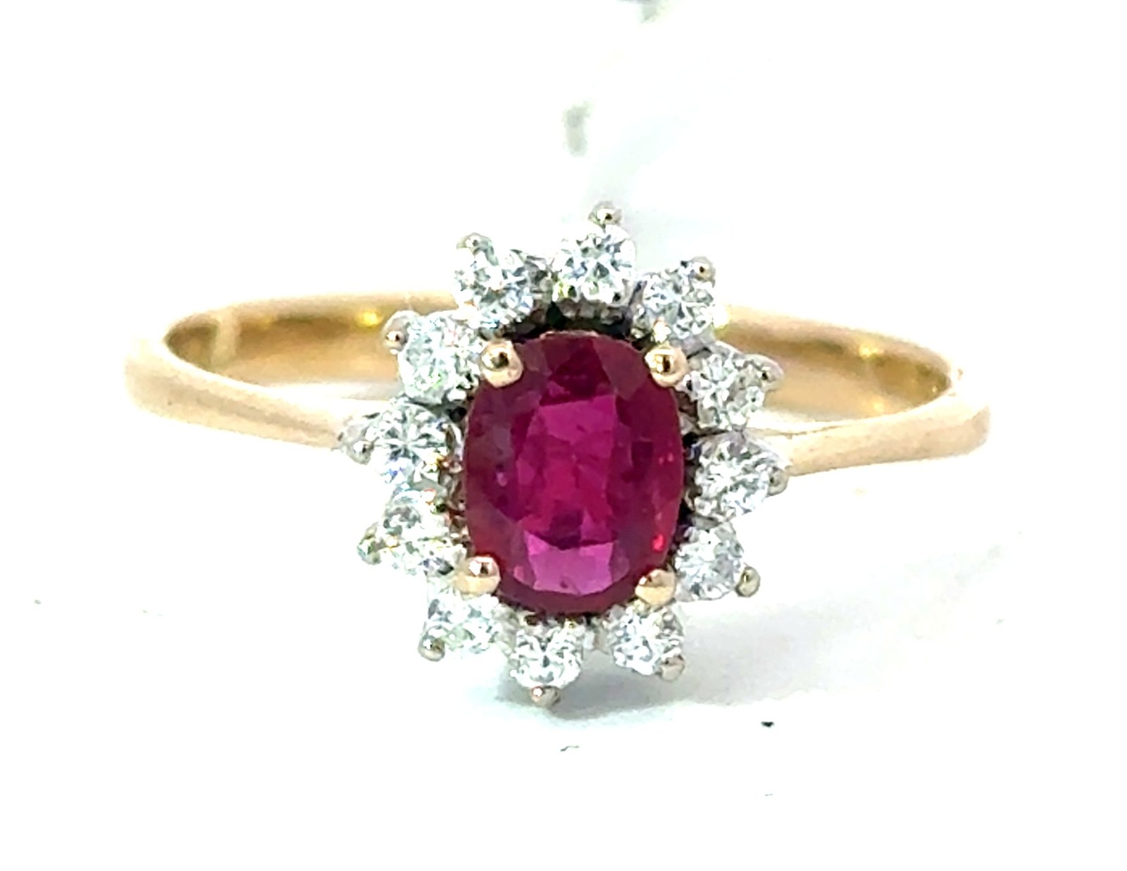GMR .jpg 14kt two tone diamond and genuine oval ruby halo ring D tw 0.25cts SI clarity, near colorless G/H color