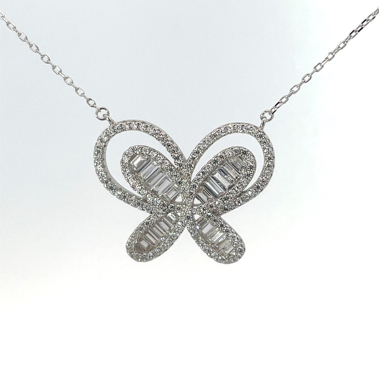 GN .jpg Sterling Silver cubic zirconia baugette and round butterfly pendant on adjustable chain