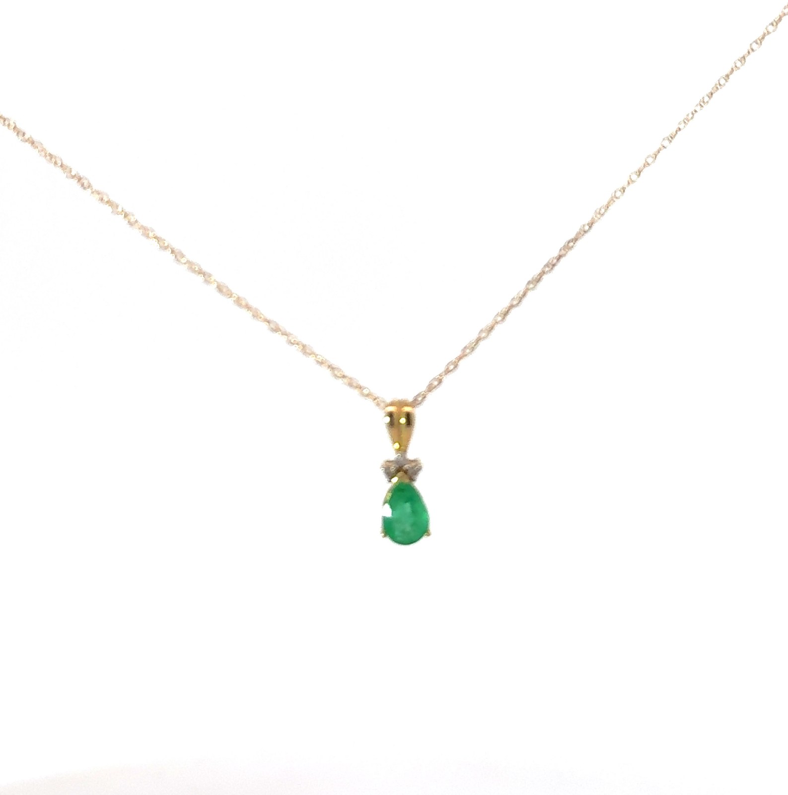 GPD .jpg 10kt yellow gold geuine emerald and diamond pendant D tw 0.02cts I1 clarity, I/J color on 18" chain