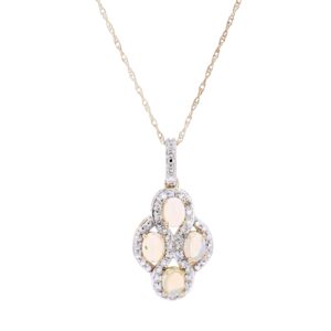 10kt yellow gold opal and diamond pendant D tw 0.20cts SI2, I on an 18" chain