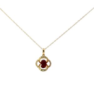 10kt yellow gold ruby and diamond fashion halo pendant D tw 0.10cts R tw 0.65cts SI, near colorless I color on 18"