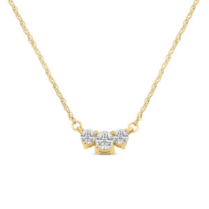 10kt yellow gold three stone pendant D tw 0.20cts SI, near colorless I color on 18" chain