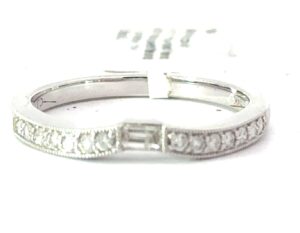 14kt white gold diamond curved band with one baguette and milgrain edge tw 0.25cts SI, H SIZE 7