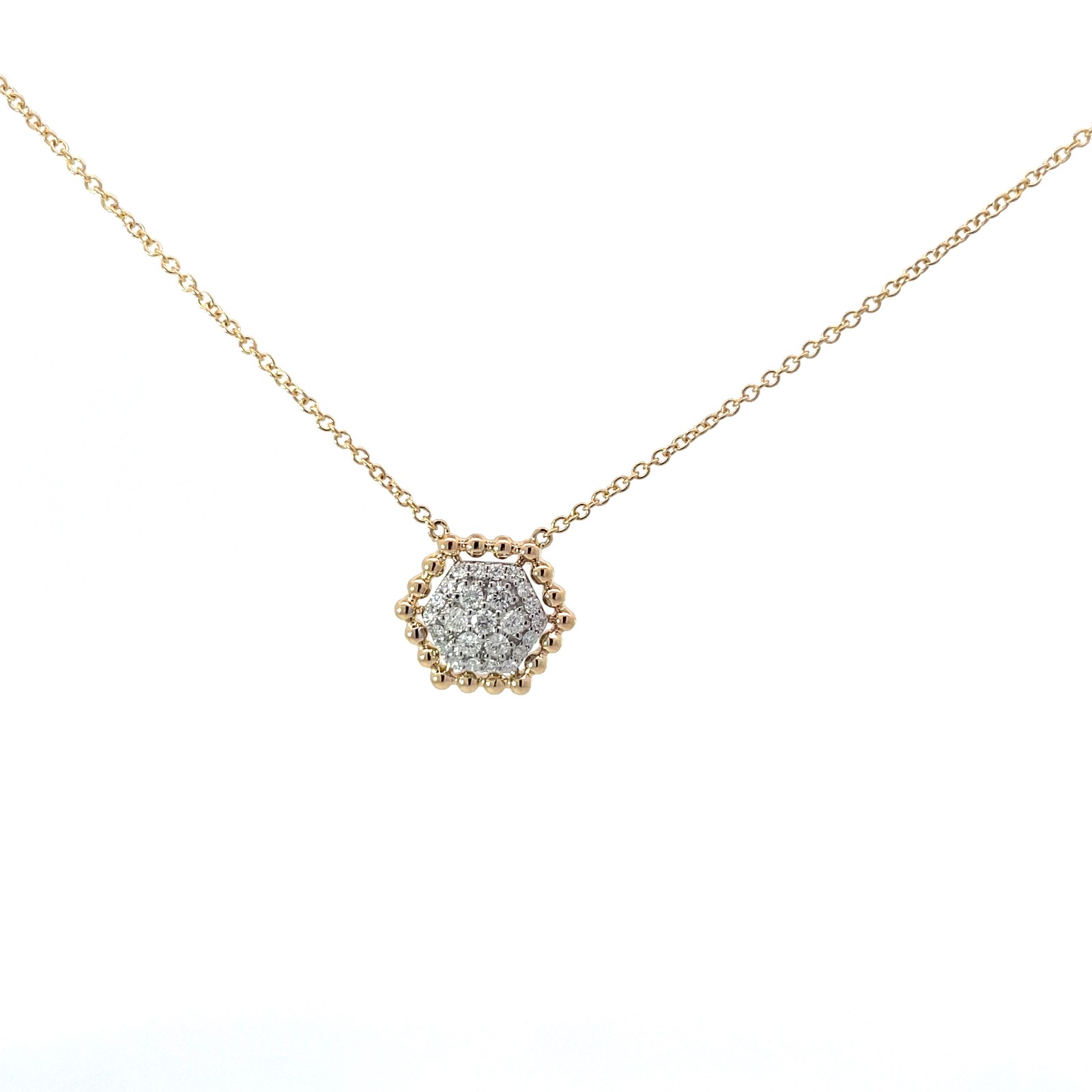 ND .jpg 14kt two tone diamond octagon pendant D tw 0.32cts SI1 clarity, near colorless G/H color on adjustable chain
