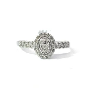 14kt white gold diamond cluster oval halo eng ring D tw 0.25cts SI, H