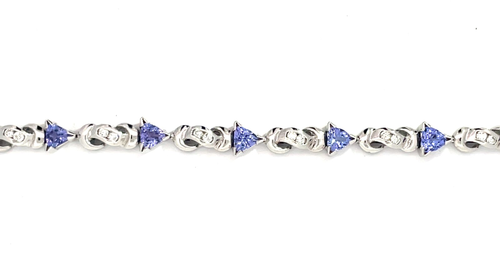 QE .jpg 14kt white gold genuine tanzanite and diamond bracelet tw 1.00cts SI1, near colorless G/H T tw 5.50cts color with foldover safety