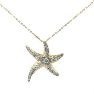 14kt two tone large diamond starfish pendant D tw 0.69cts SI1, near colorless G/H on a cable chain with claw catch closure